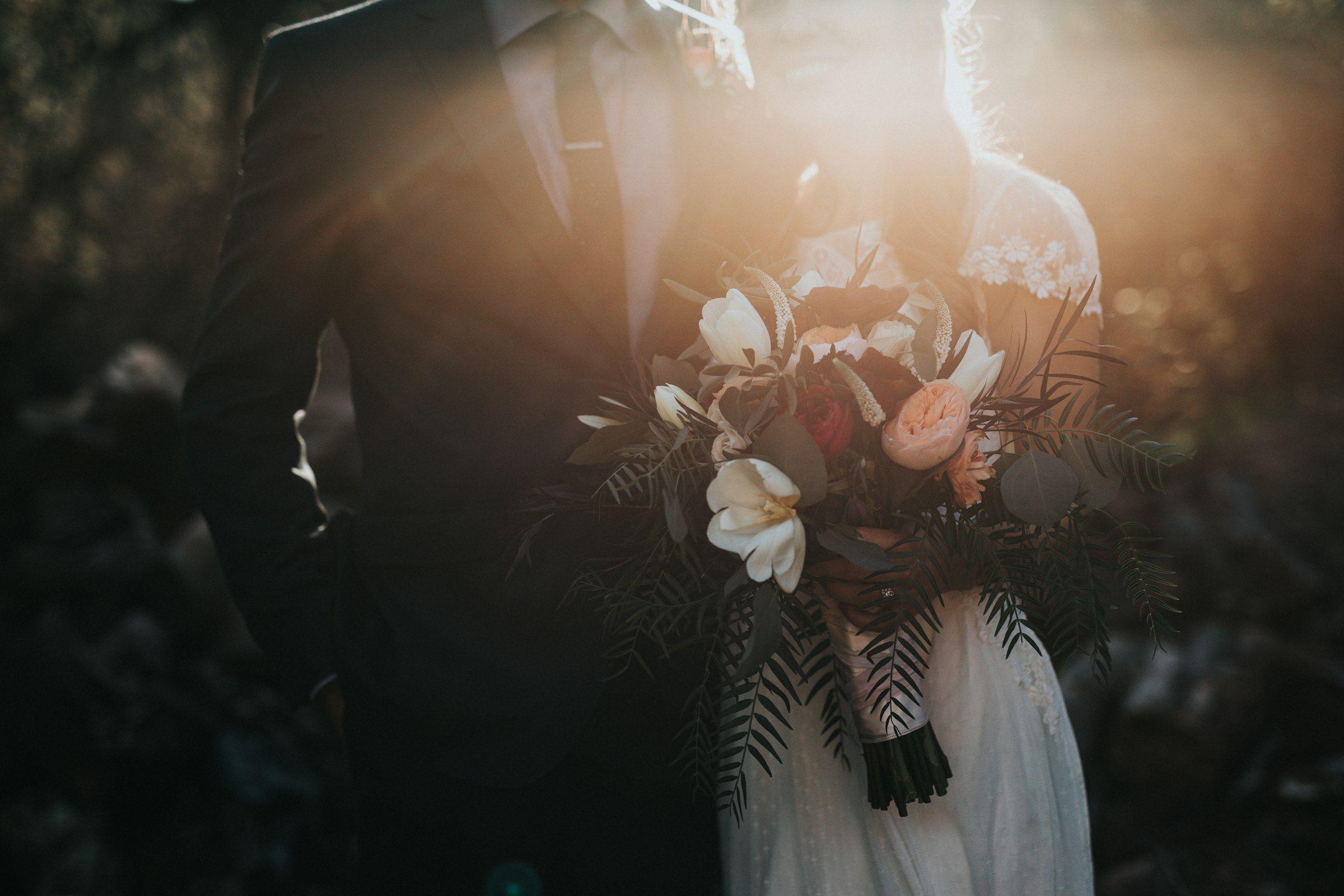 Bride and groom in cinematic evening light at a luxury wedding
