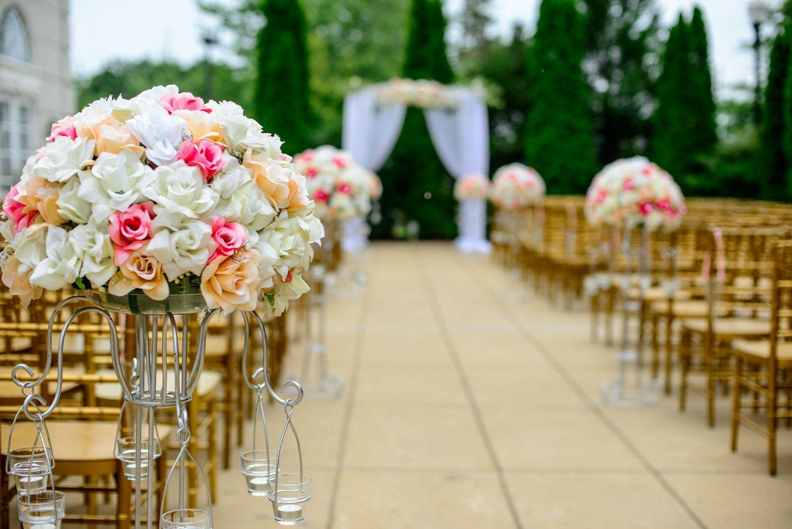 Candlelit reception tables in a grand ballroom